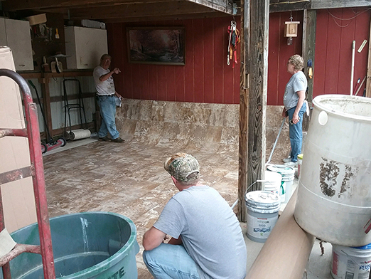 Debbie, LeRoy and Pino Measure Out the New Floor Tile